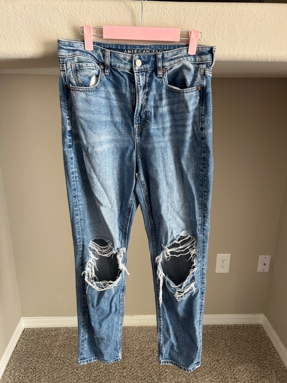 American Eagle Outfitters Women’s Light Blue High-Rise Distressed Jeans